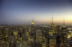 A photo of New York city at night. 